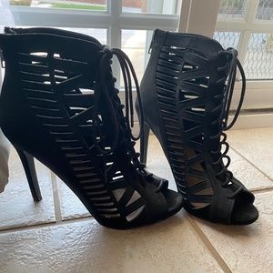 Black caged lace up pumps